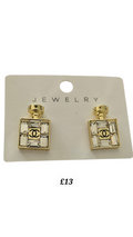 CC perfume Bottle Earrings